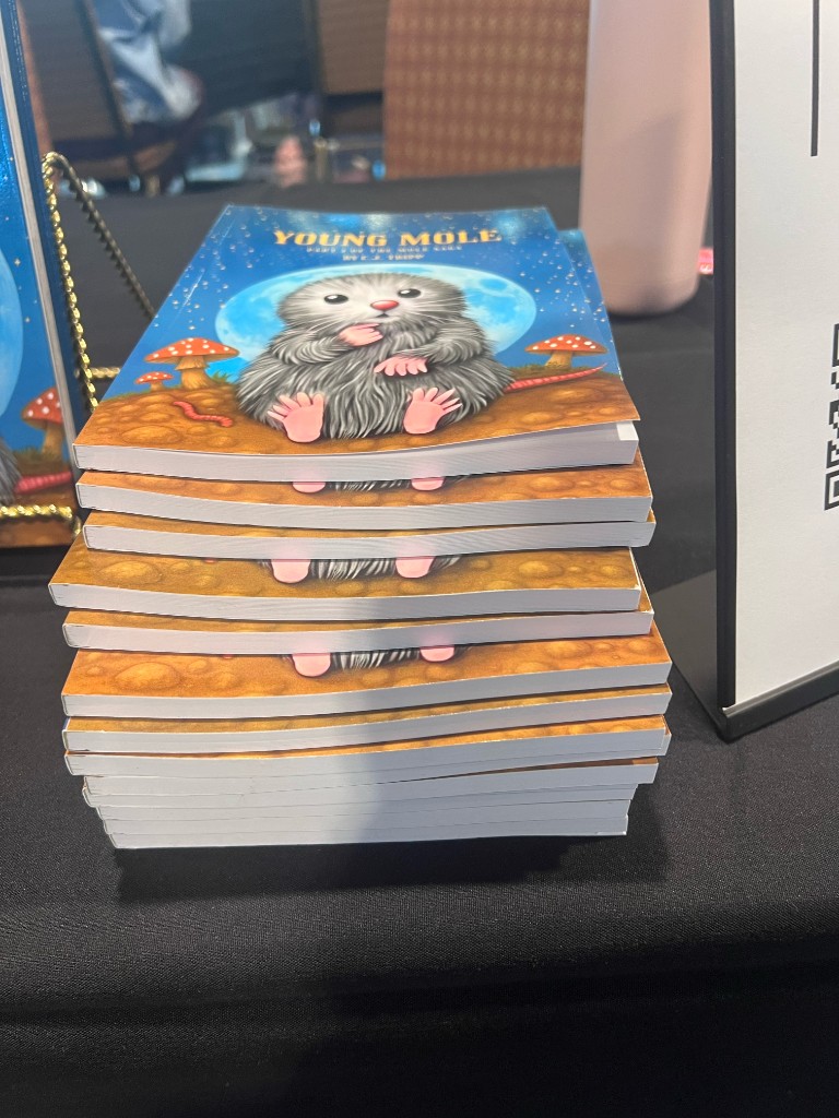 Stack of Young Mole books at AutCon